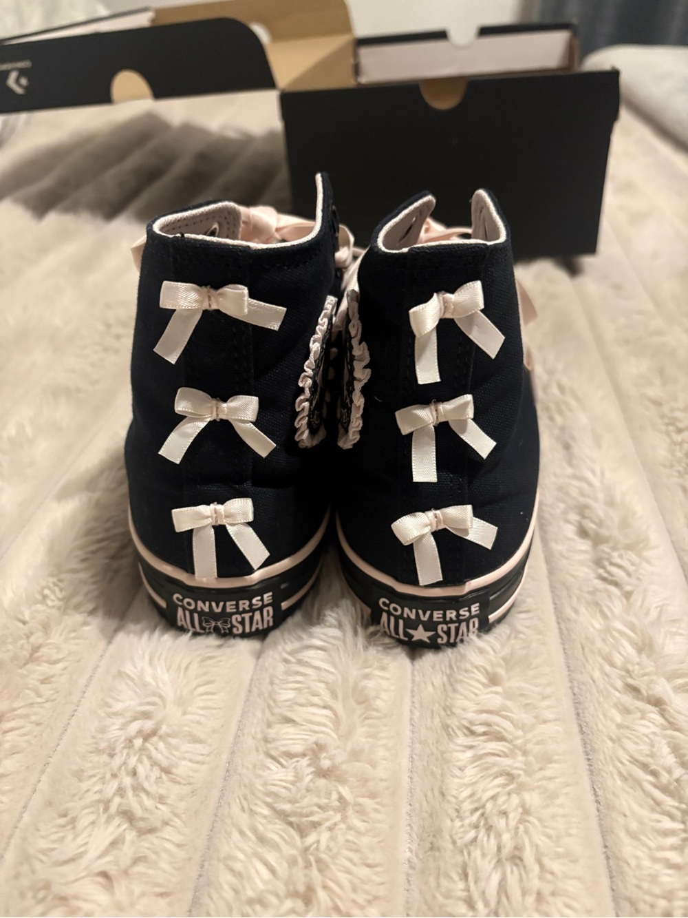 Converse Black High-Top Sneakers with Pink Ribbon Bows